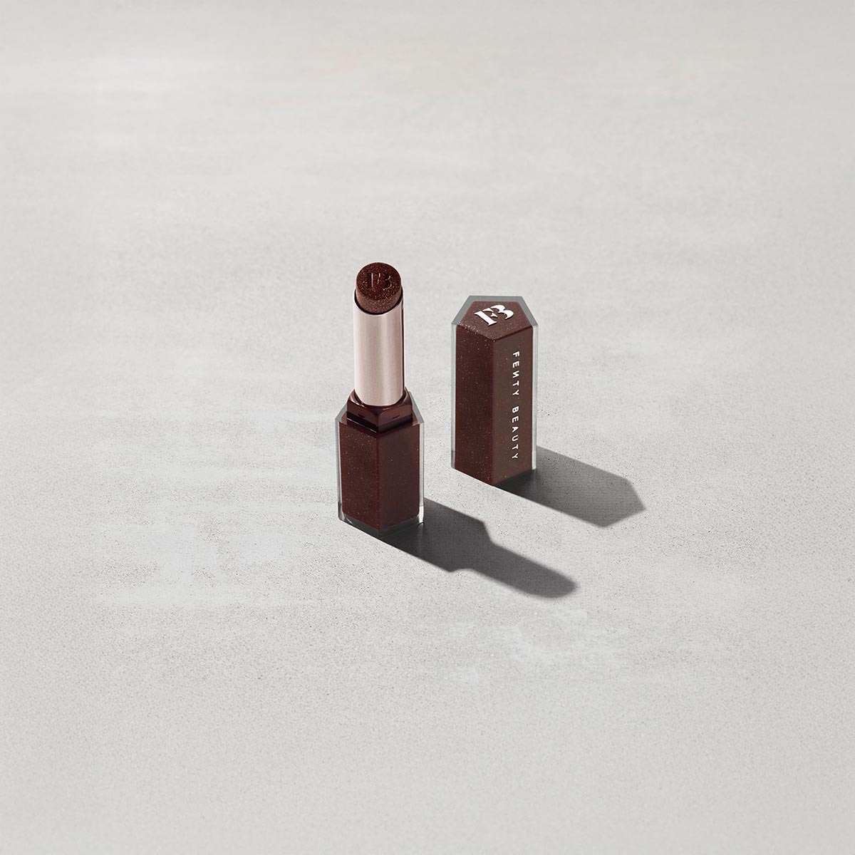 GLOSS BOMB STIX SHIMMER (LABIAL CON ACABADO BRILLOSO)